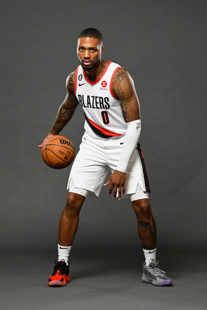 Damian Lillard poses for a picture during media day.